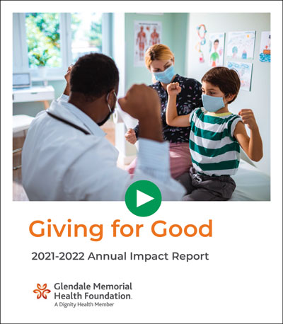 Annual Report Cover 2022 - Pediatrician with young boy and Mom
